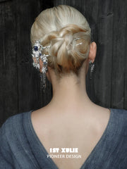 Back view of a pinned hairstyle with the dangling hair ornament