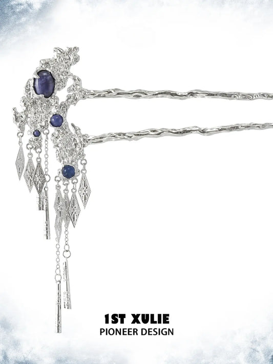 Ornate blue stone hair pin with its two prongs and chain drops visible