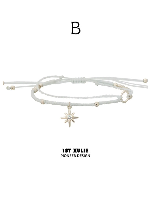 Style B white adjustable cord bracelet with a hanging star