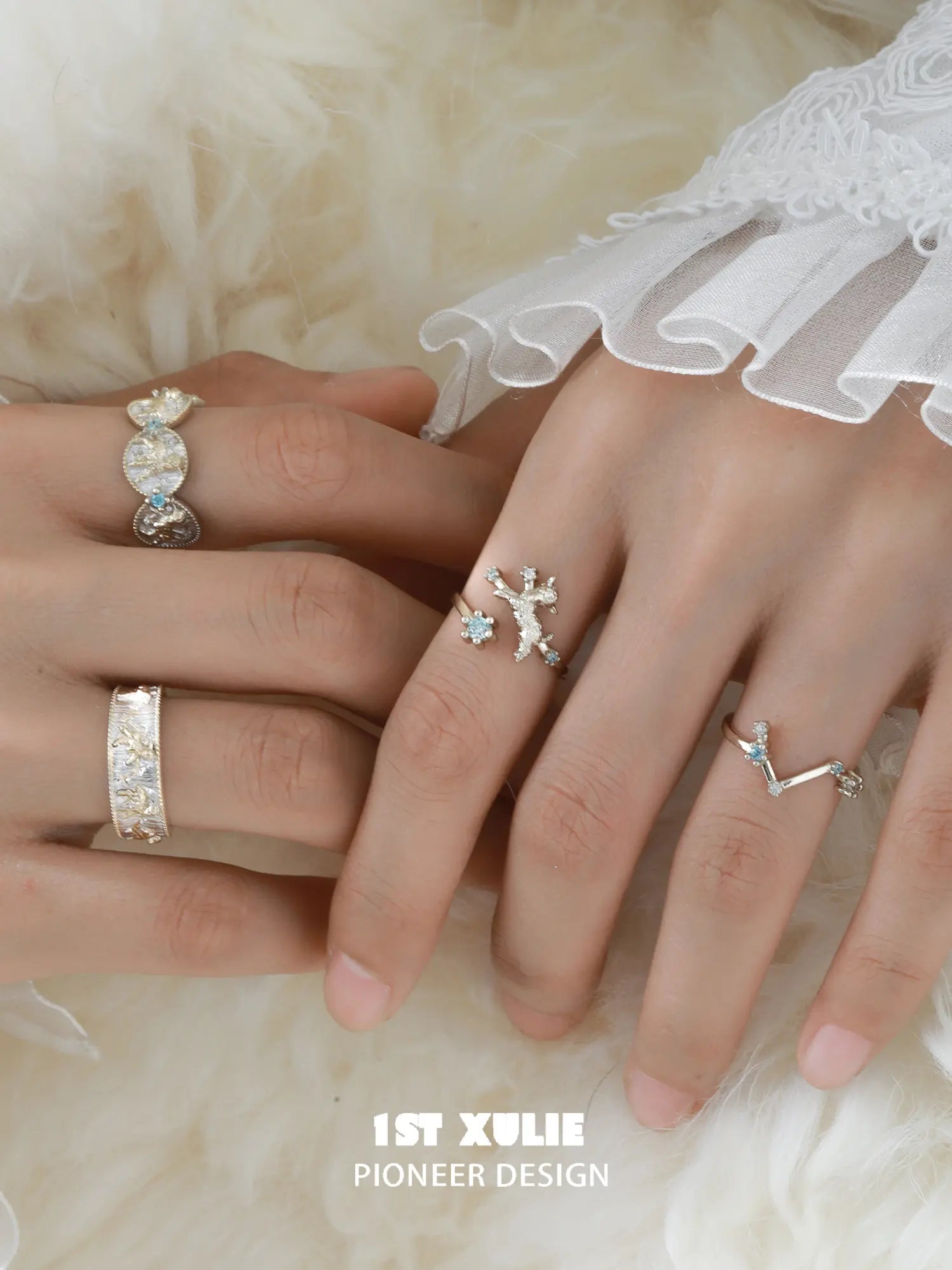 Celestial medallion and patterned band rings worn with coordinating jewelry
