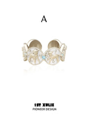 Style A double celestial medallion ring