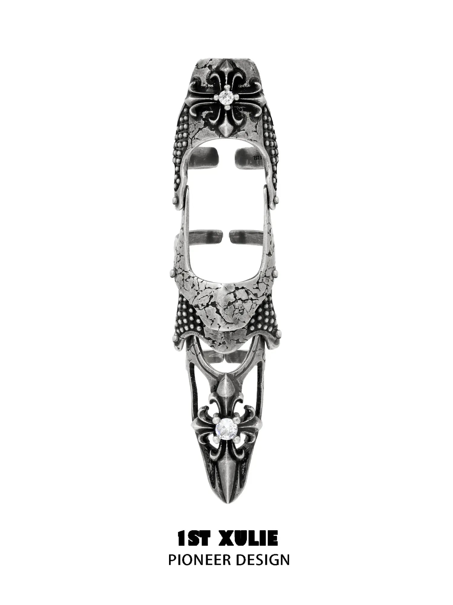 Long gothic open armor ring with raised fleur-de-lis details and pointed end