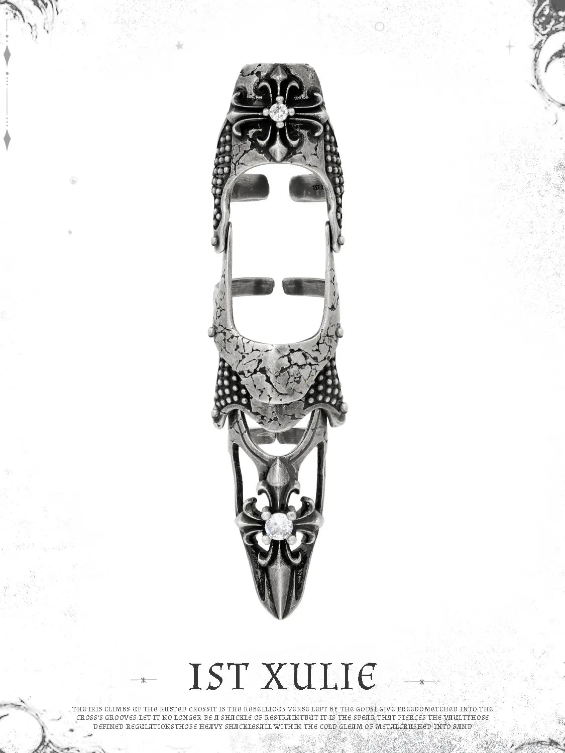 Long gothic armor ring on a pale ornamental background