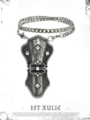 Gothic thumb ring displayed against a decorative border