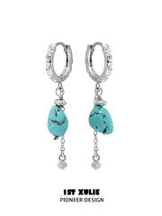 Pair of silver-toned hoop earrings with irregular turquoise drops and fine chain details